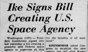 newspaper clipping entitled IKE SIGNS BILL CREATING U.S. SPACE AGENCY