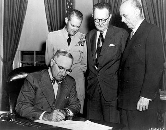 Former President Truman signs document